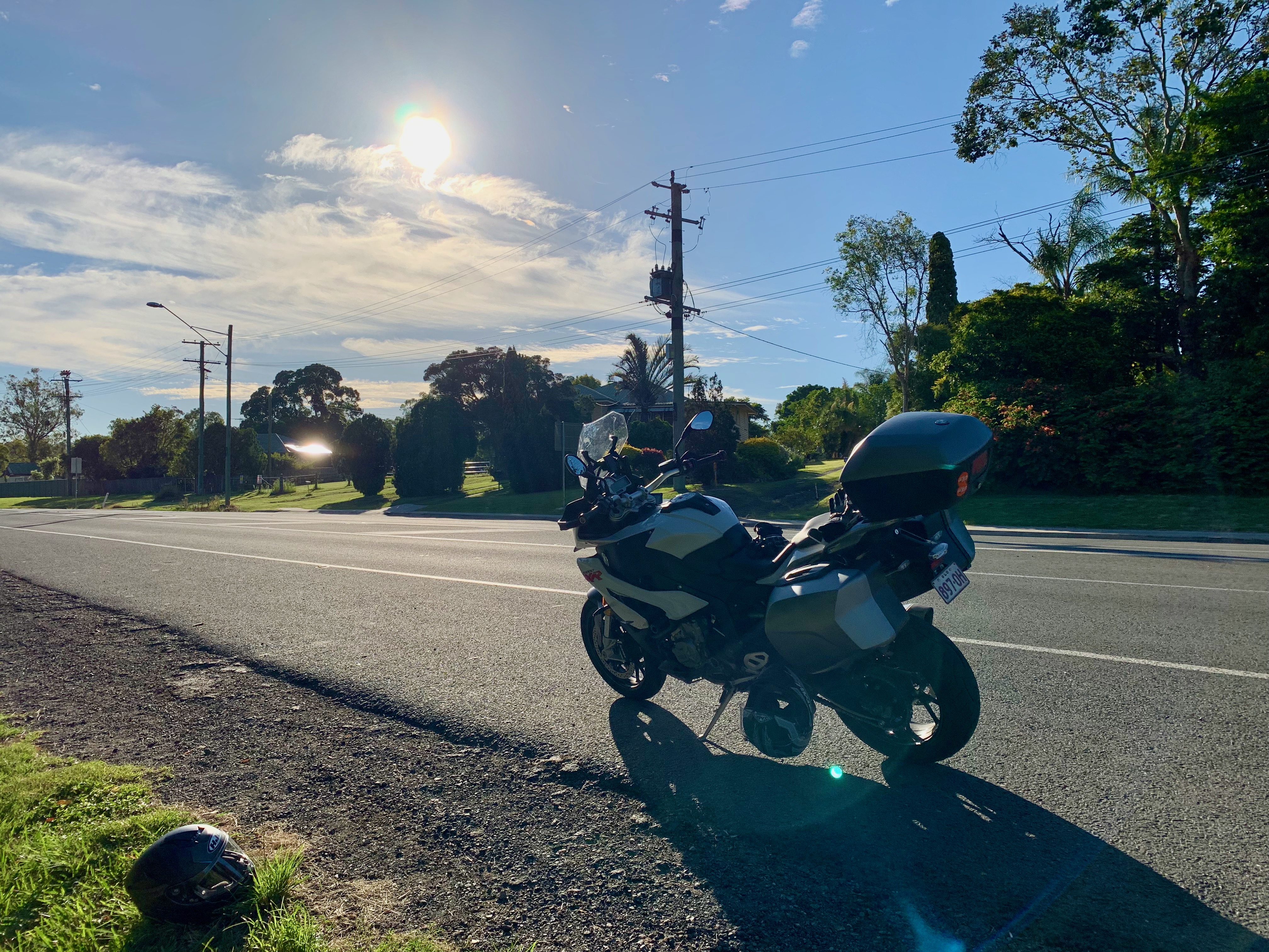 A motorbike loaded up for two.